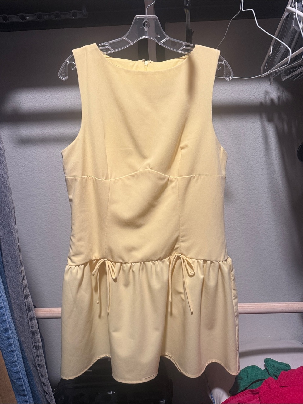 Sleeveless Pale Yellow Peplum Dress